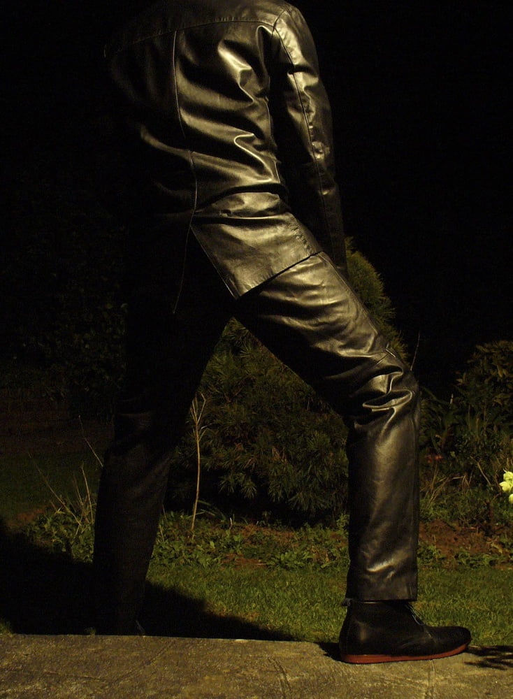 Leather Master outdoors at night #107189062