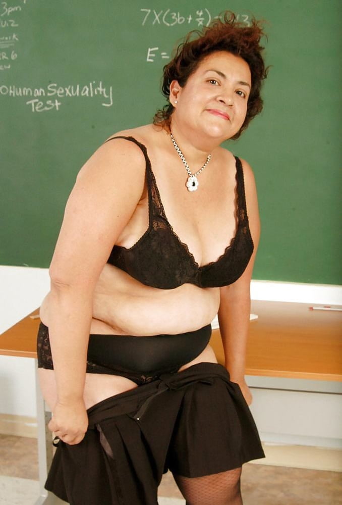 Mature teacher strips down to just her fishnet stockings #97814309