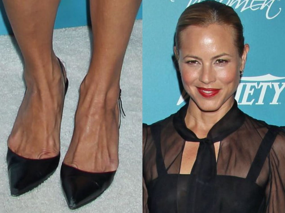 Jambes sexy de Maria bello pieds et talons hauts
 #99537677