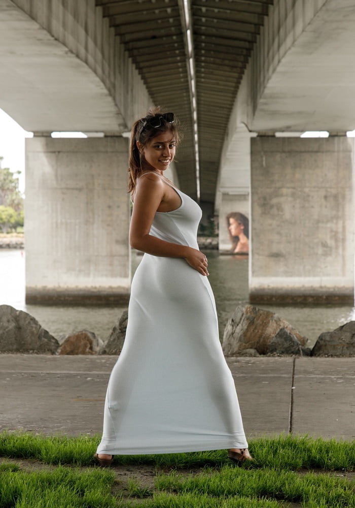 Exotic Girl Posing In Her White Dress #102068257