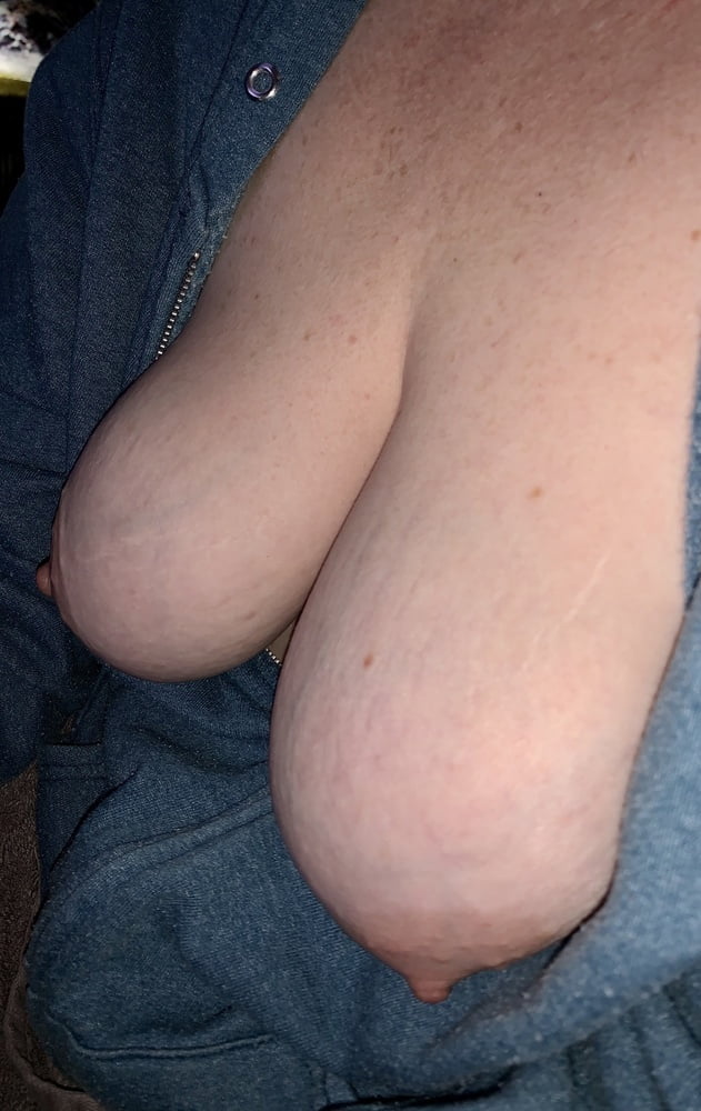 Big saggy tits. Unzipped and coming out. #96114659