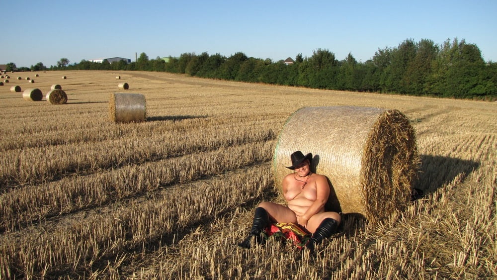 Anna naked on straw bales ... #93011878