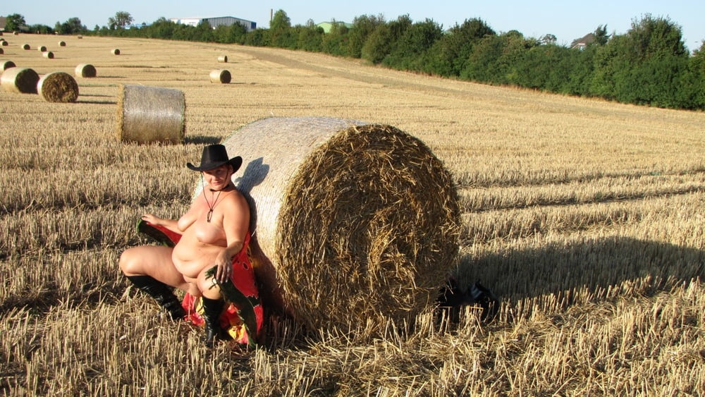 Anna naked on straw bales ... #93011887