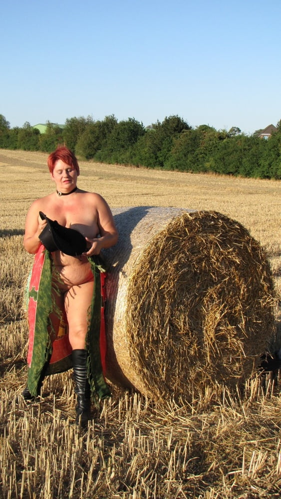 Anna naked on straw bales ... #93011896