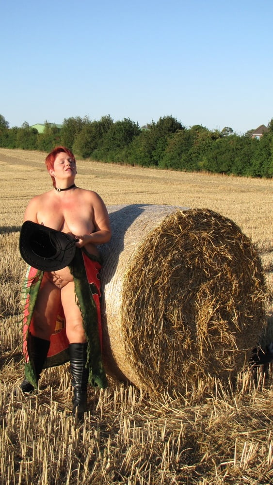 Anna naked on straw bales ... #93011899