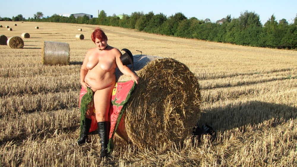 Anna naked on straw bales ... #93011933