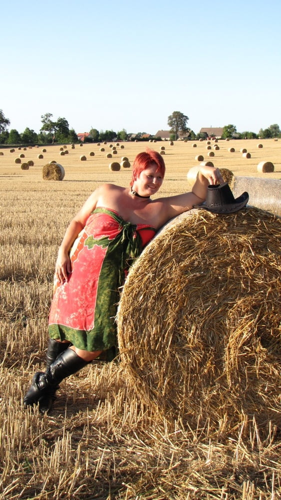 Anna naked on straw bales ... #93011962
