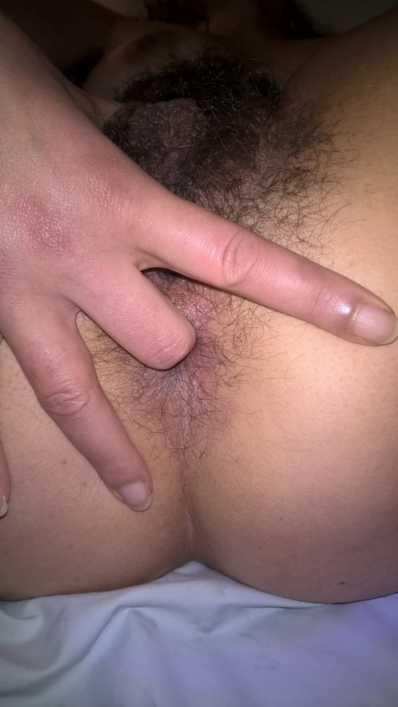 My beautiful wife fingering her hairy ass #106616584