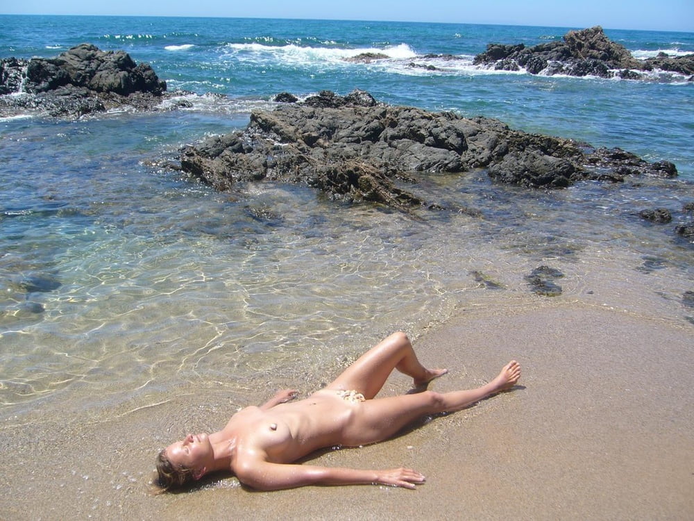 Nude at the beach #104379459
