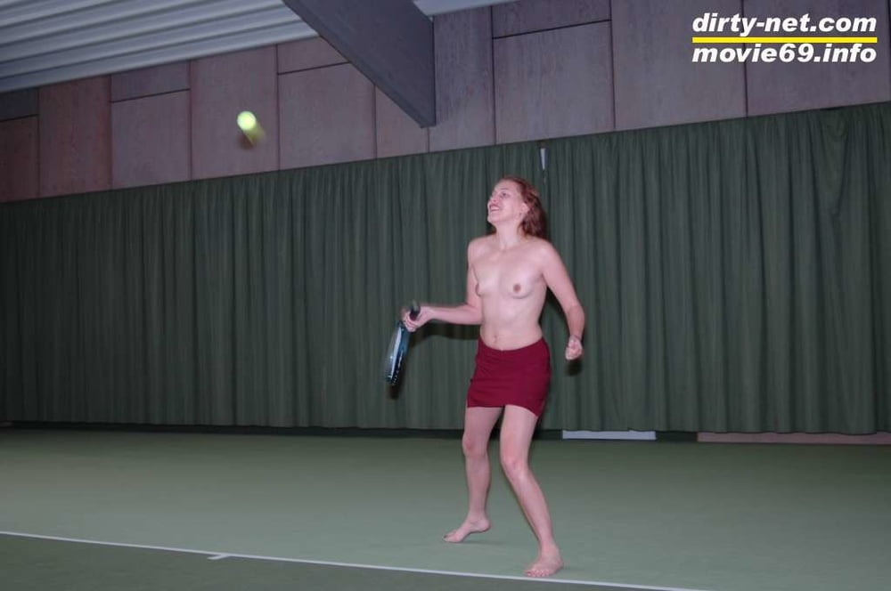 Nathalie plays naked tennis in a tennis hall
 #106692950