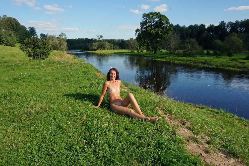 Nude on the beach Derzha-river #94747216