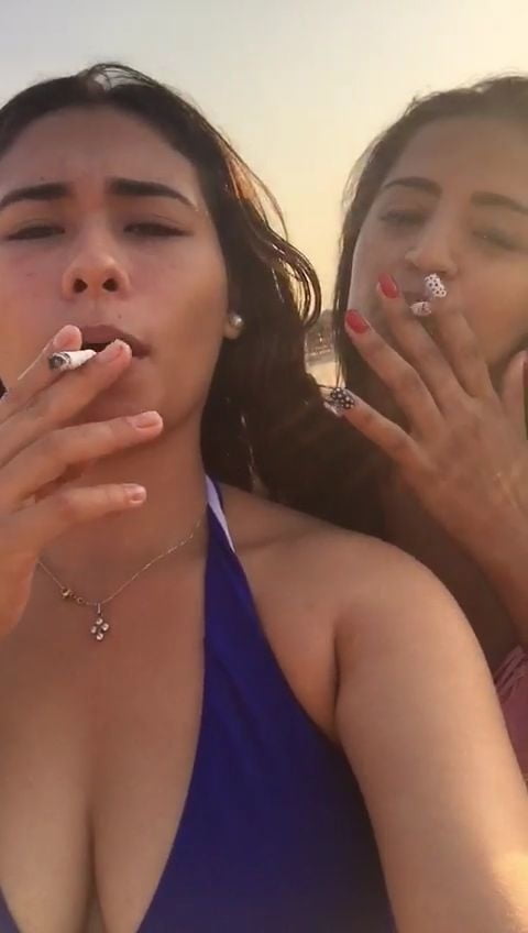 Smoking Kelly Cuesta on beach with lez gf #103943191