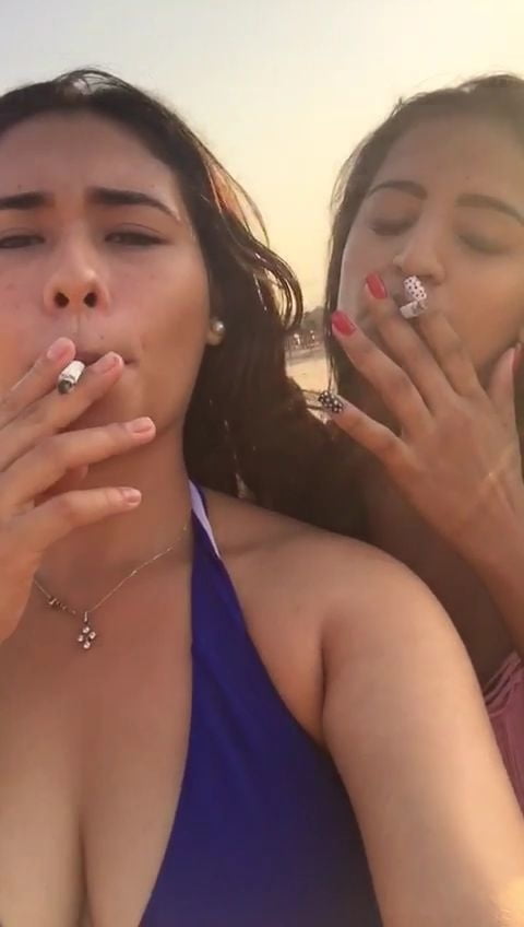 Smoking Kelly Cuesta on beach with lez gf #103943193
