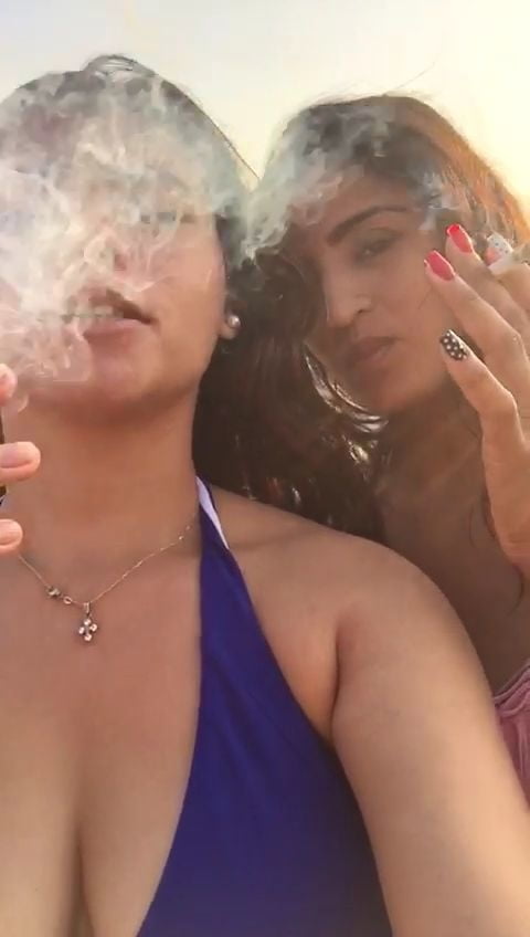 Smoking Kelly Cuesta on beach with lez gf #103943195