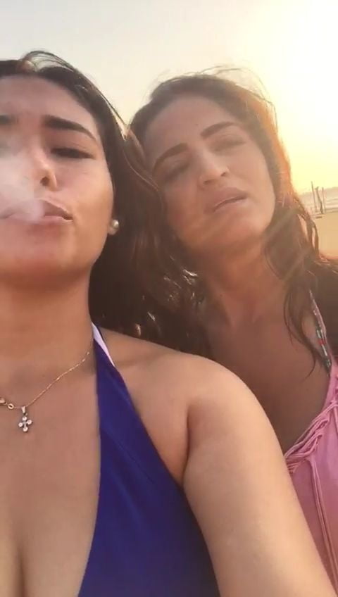 Smoking Kelly Cuesta on beach with lez gf #103943196