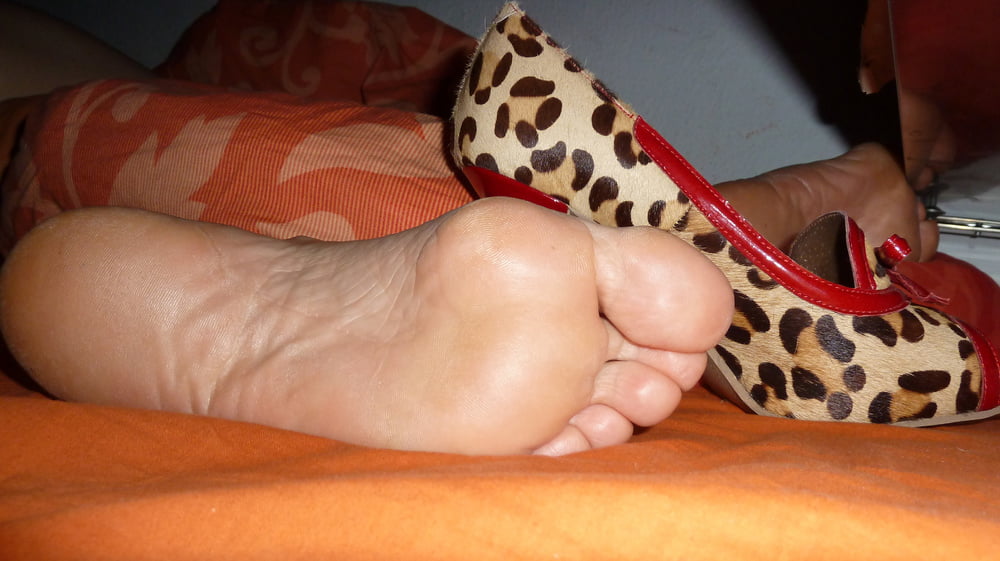 the sleeping feet of my wife #106886148