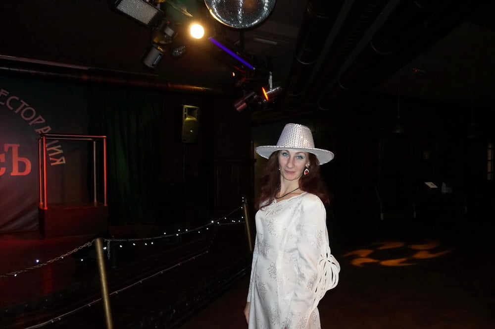 In Wedding Dress and White Hat on stage #106861185