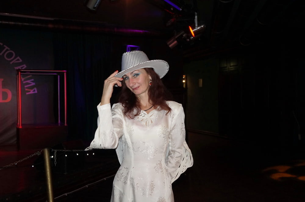 In Wedding Dress and White Hat on stage #106861187