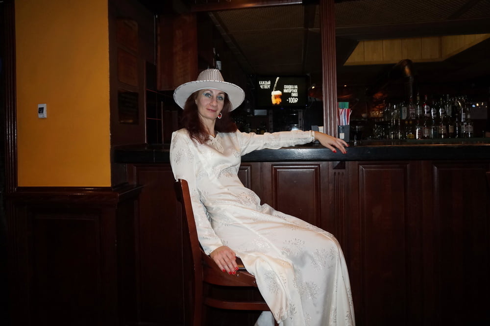 In Wedding Dress and White Hat on stage #106861203