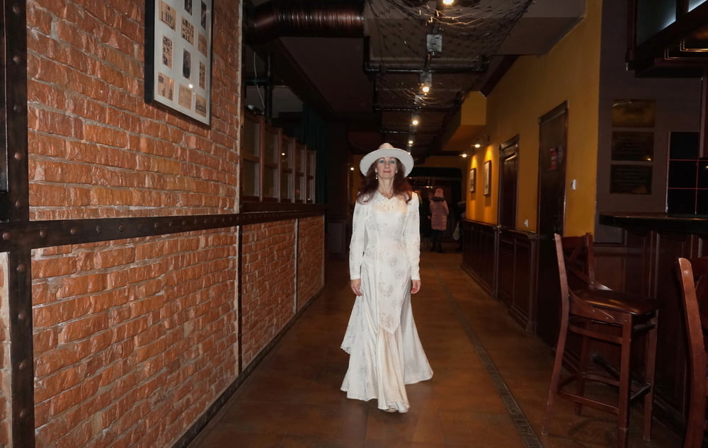 In Wedding Dress and White Hat on stage #106861211