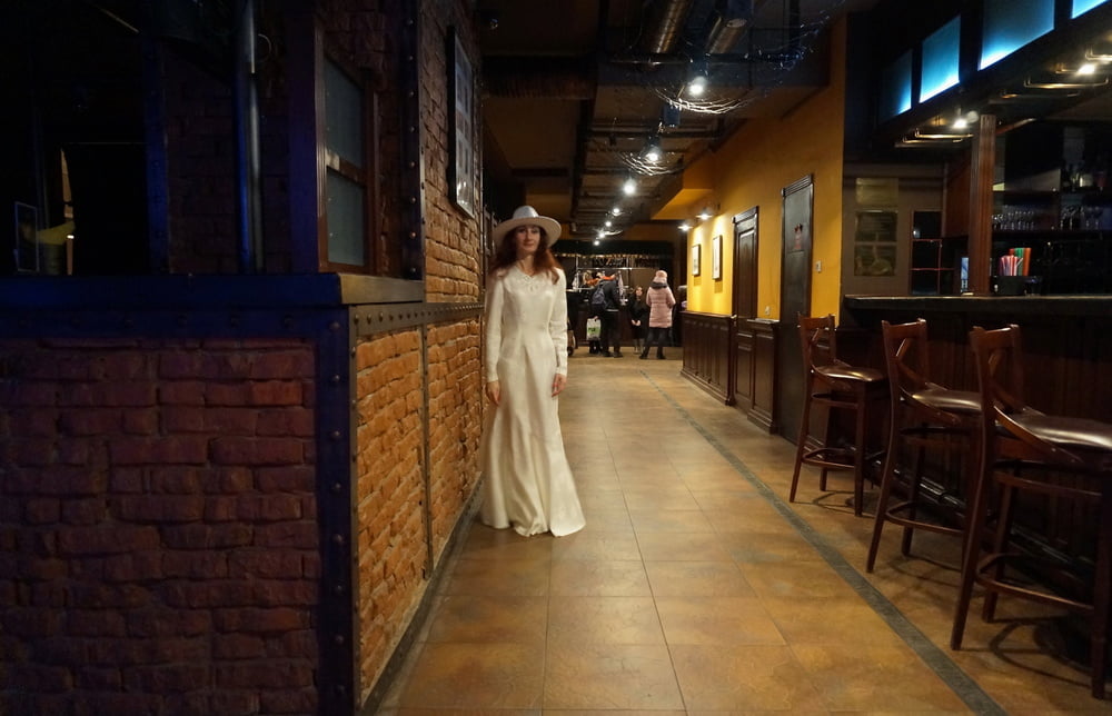 In Wedding Dress and White Hat on stage #106861214