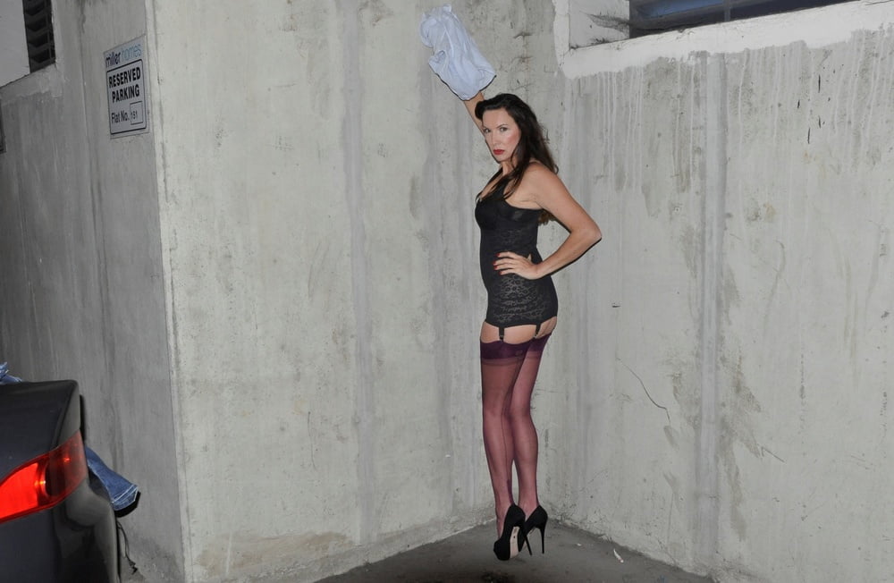 Jane In Stockings And Heels At The Carpark #89030683