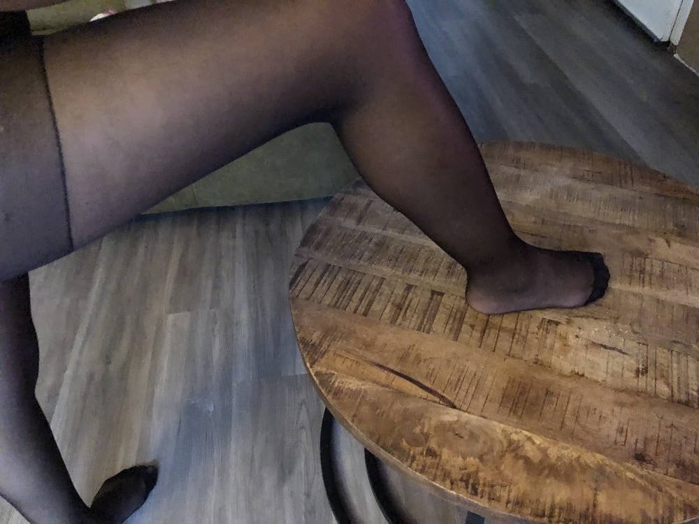Feet in black stockings #91314321