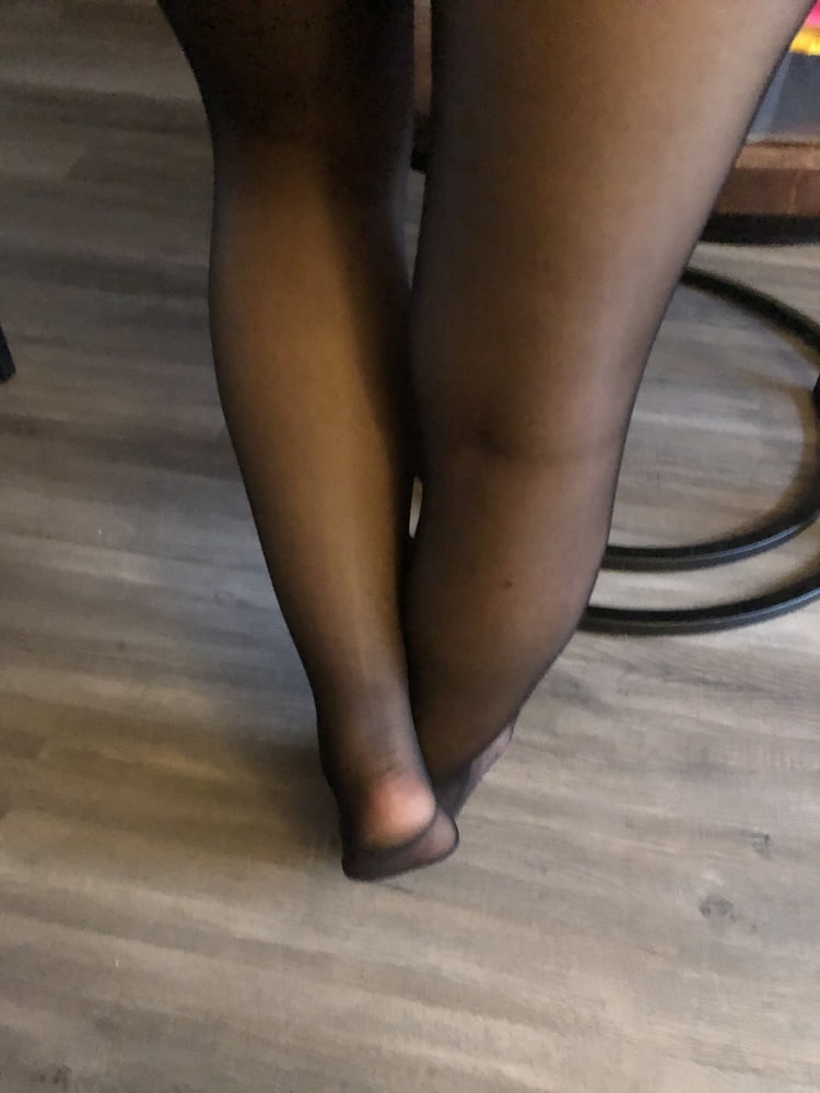 Feet in black stockings #91314340