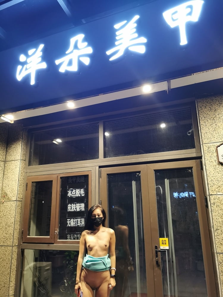 Chinese girl flashing in public #80742629