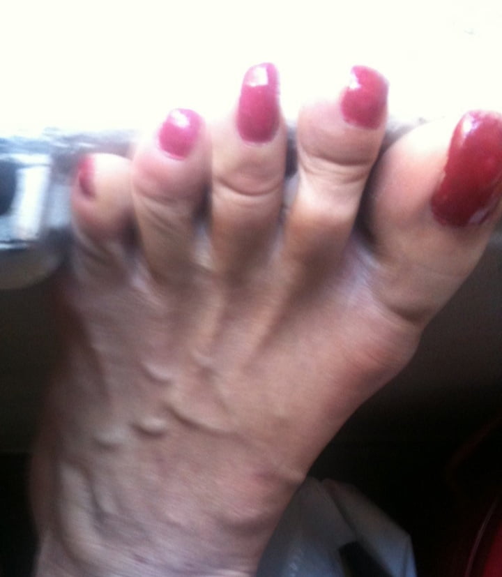 red toenails mix (older, dirty, toe ring, sandals mixed). #106916258