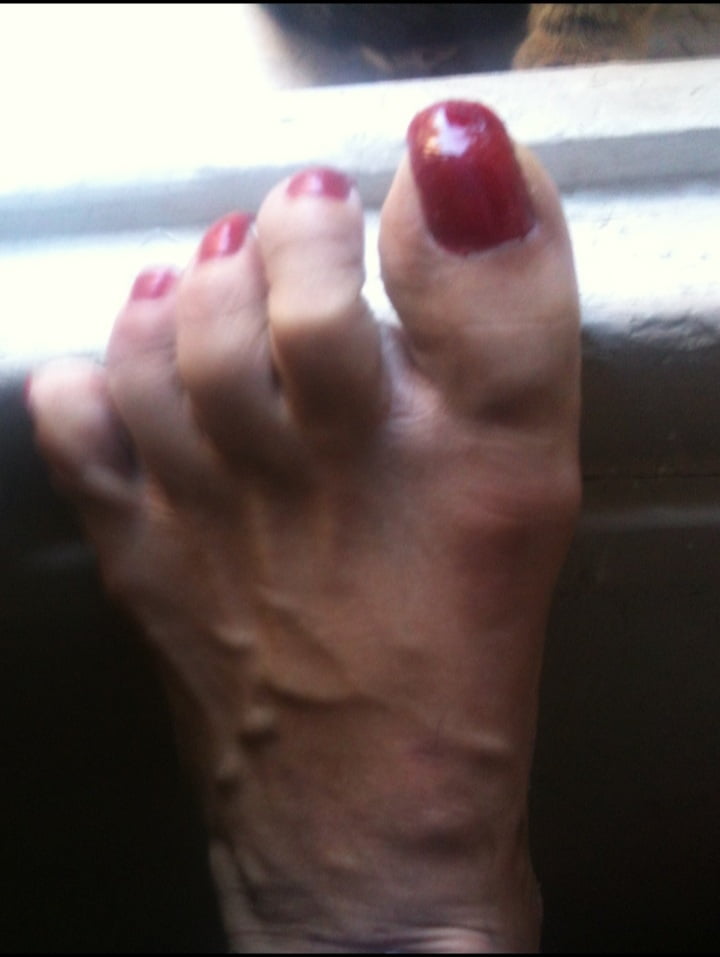 red toenails mix (older, dirty, toe ring, sandals mixed). #106916264