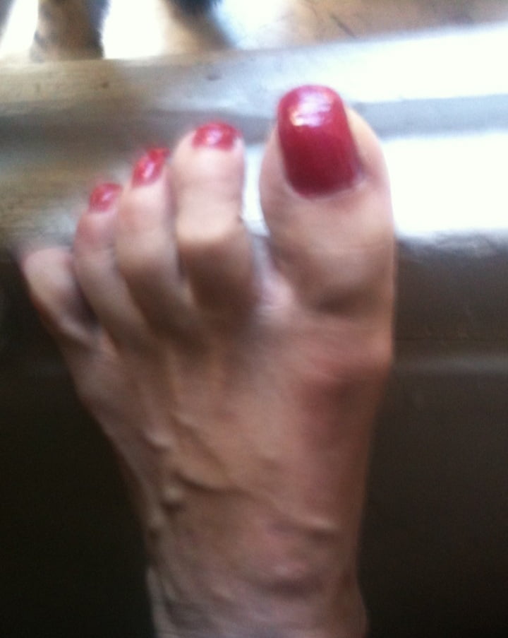 red toenails mix (older, dirty, toe ring, sandals mixed). #106916270