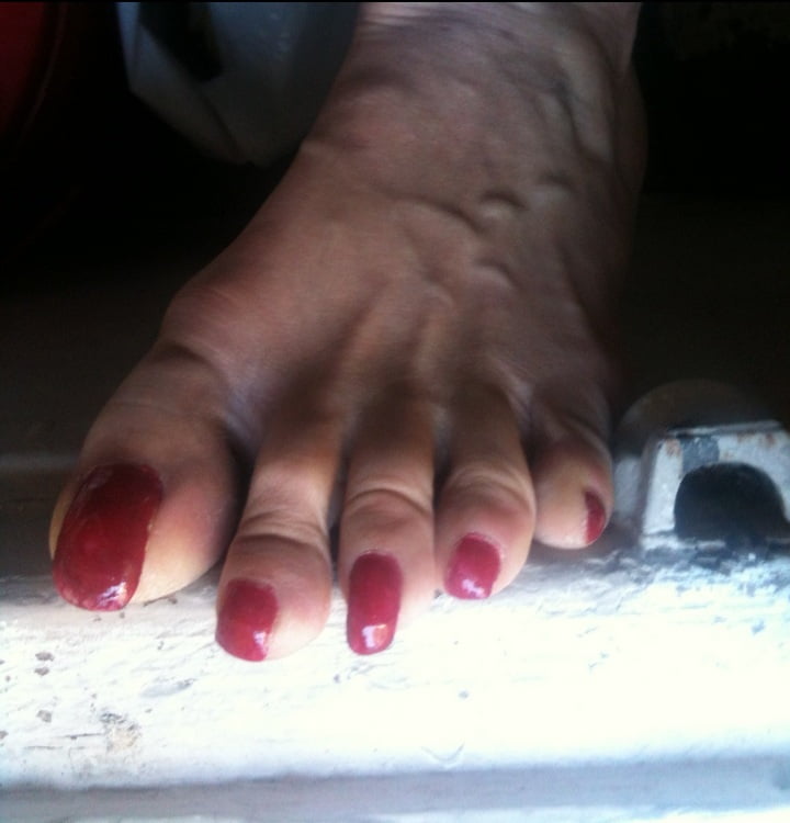 red toenails mix (older, dirty, toe ring, sandals mixed). #106916273