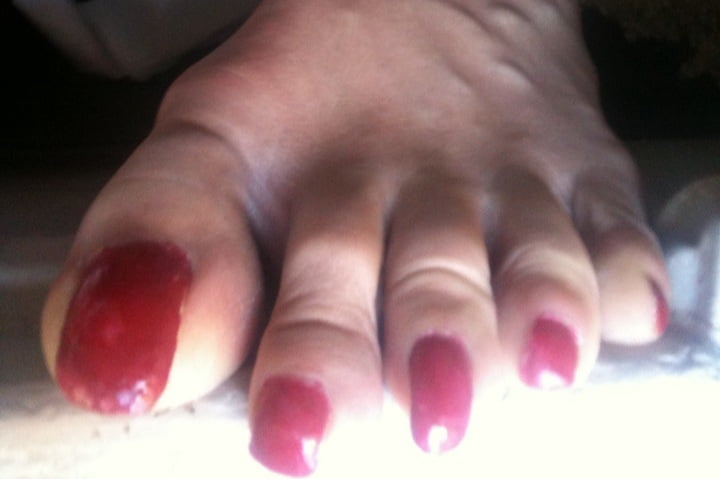 red toenails mix (older, dirty, toe ring, sandals mixed). #106916283