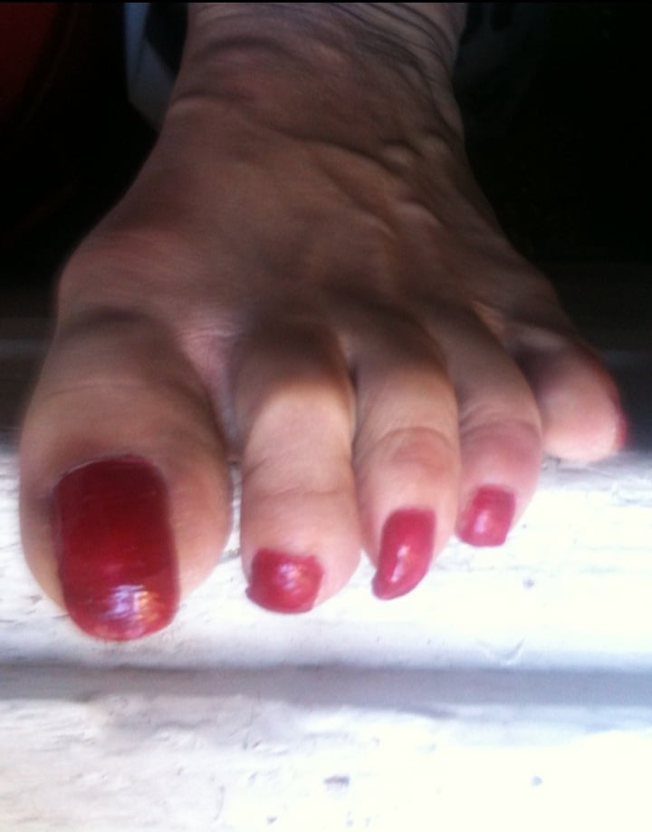 red toenails mix (older, dirty, toe ring, sandals mixed). #106916286