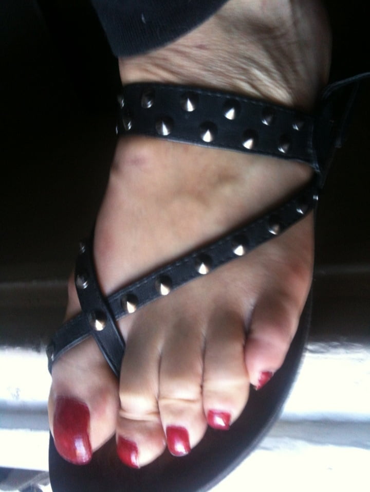 red toenails mix (older, dirty, toe ring, sandals mixed). #106916313