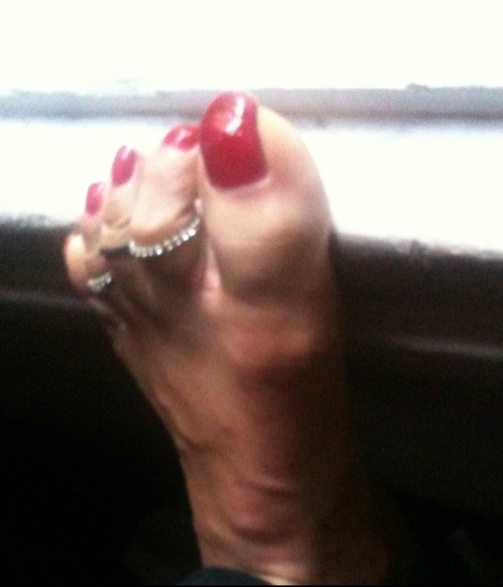 red toenails mix (older, dirty, toe ring, sandals mixed). #106916320