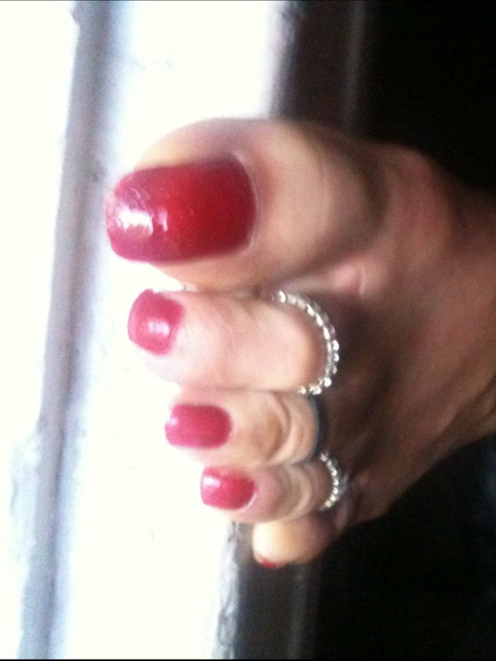 red toenails mix (older, dirty, toe ring, sandals mixed). #106916325