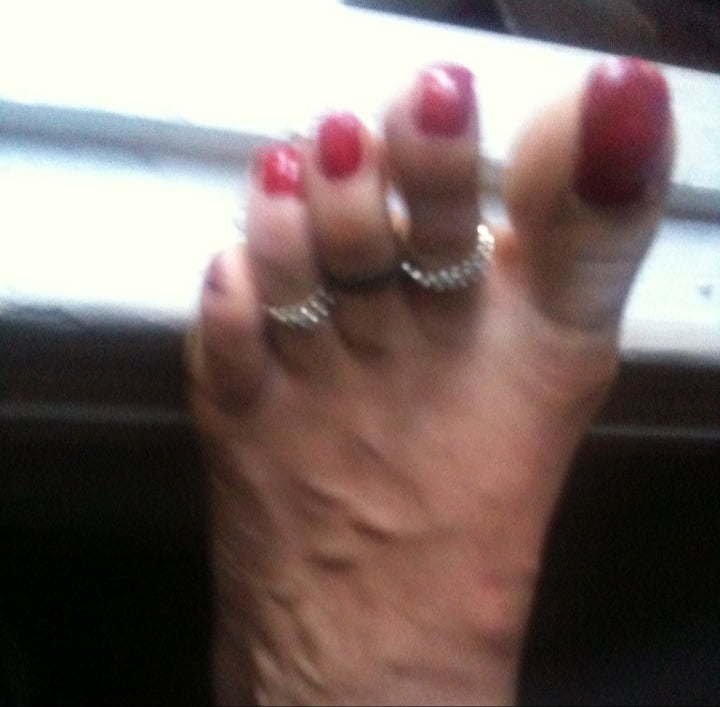 red toenails mix (older, dirty, toe ring, sandals mixed). #106916334