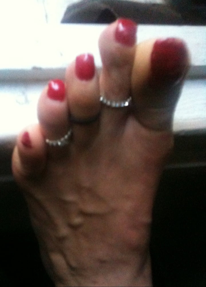 red toenails mix (older, dirty, toe ring, sandals mixed). #106916336