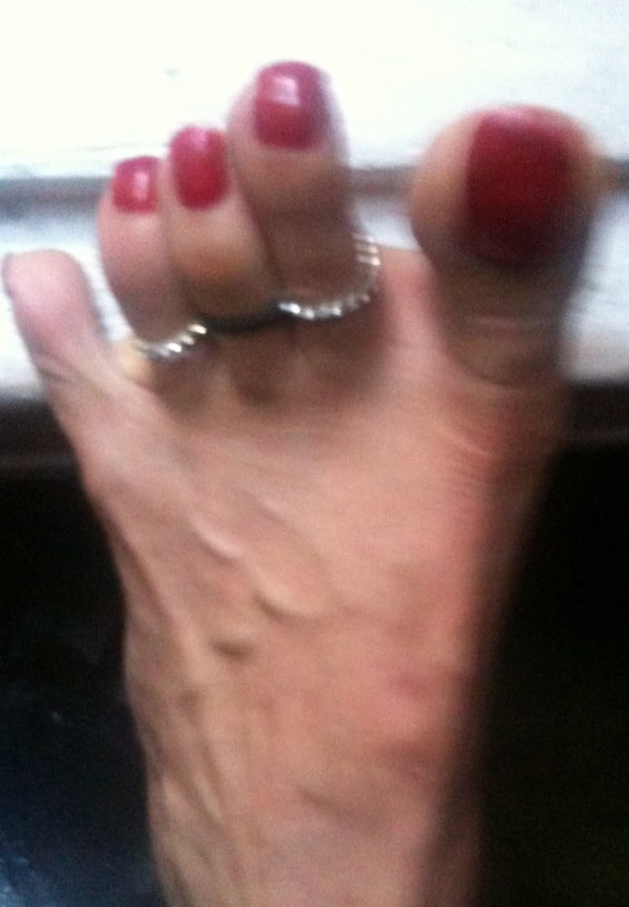 red toenails mix (older, dirty, toe ring, sandals mixed). #106916338