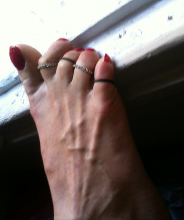 red toenails mix (older, dirty, toe ring, sandals mixed). #106916352