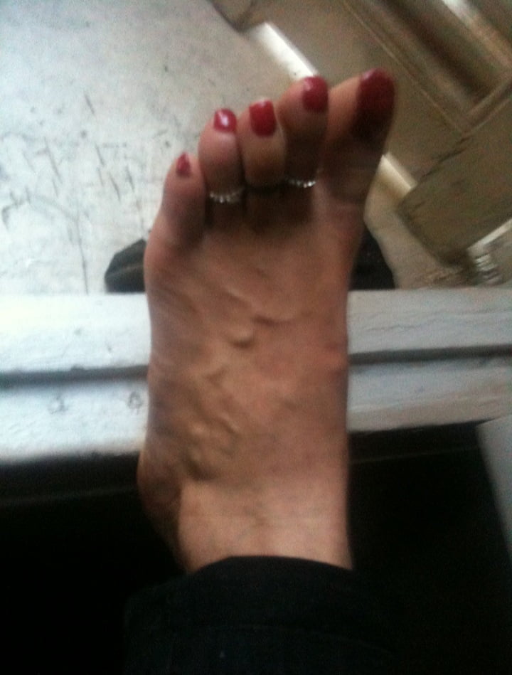 red toenails mix (older, dirty, toe ring, sandals mixed). #106916360