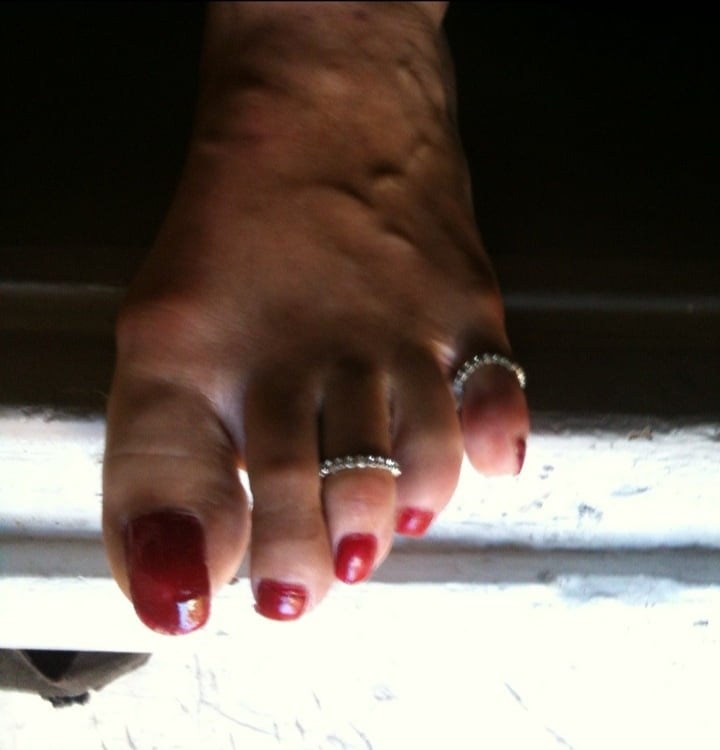 red toenails mix (older, dirty, toe ring, sandals mixed). #106916361