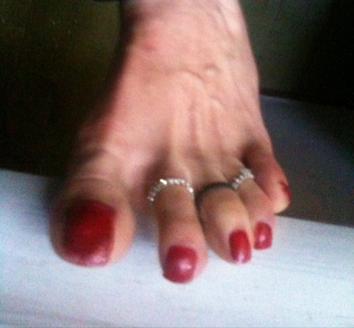 red toenails mix (older, dirty, toe ring, sandals mixed). #106916365