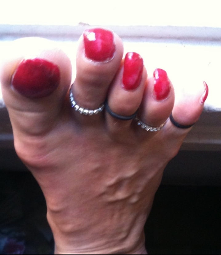 red toenails mix (older, dirty, toe ring, sandals mixed). #106916373