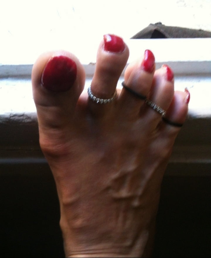 red toenails mix (older, dirty, toe ring, sandals mixed). #106916379