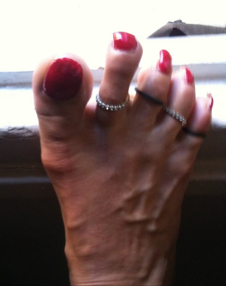 red toenails mix (older, dirty, toe ring, sandals mixed). #106916382