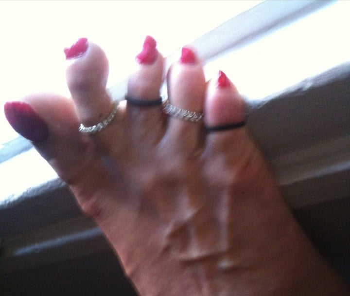 red toenails mix (older, dirty, toe ring, sandals mixed). #106916389