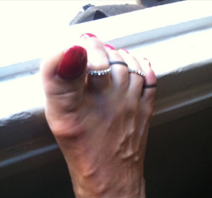 red toenails mix (older, dirty, toe ring, sandals mixed). #106916392